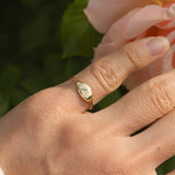 14k Solid gold initial pinky ring worn on hand, high polish finish