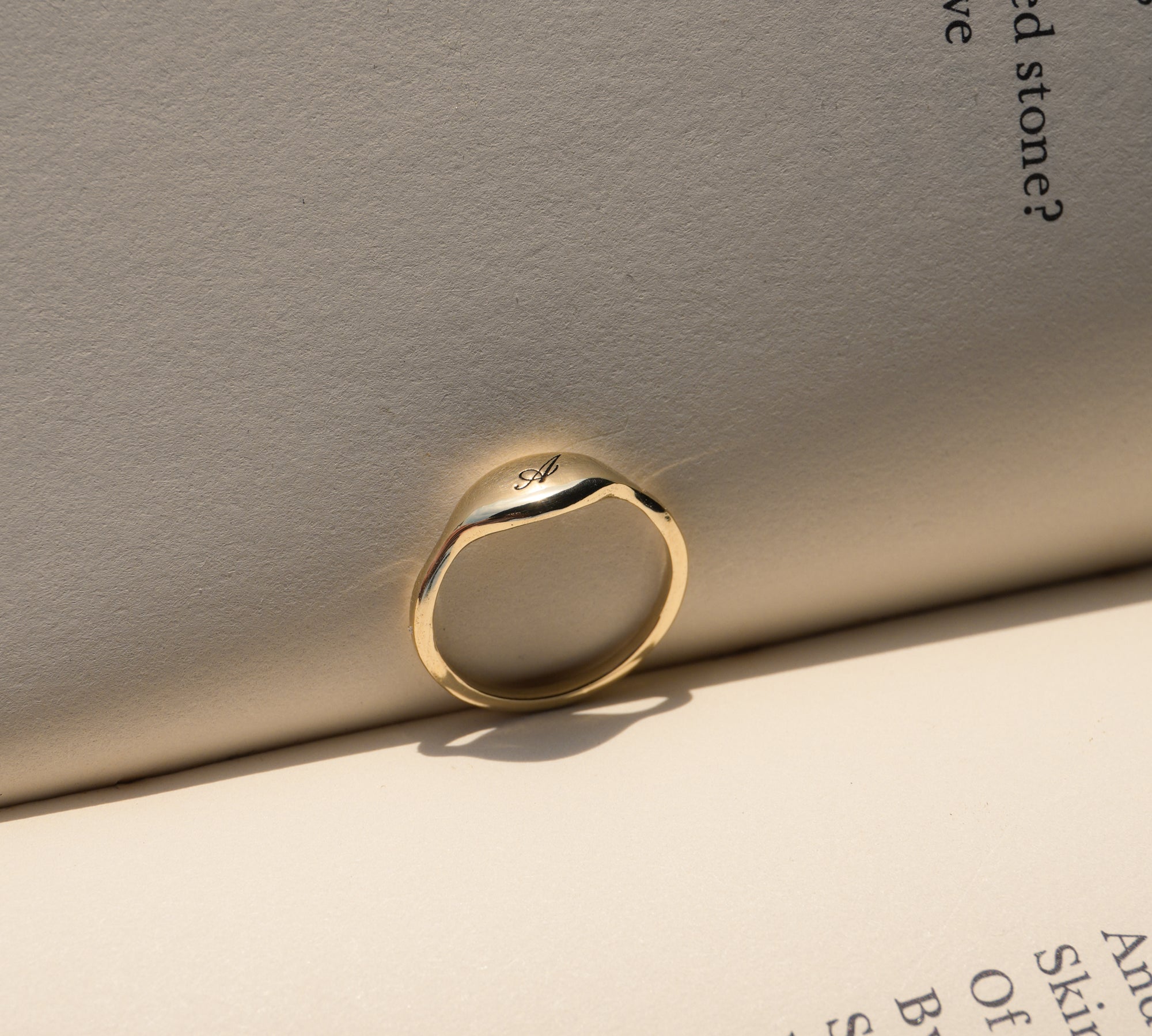 14k solid gold initial pinky ring with engraved letter on puffy signet face