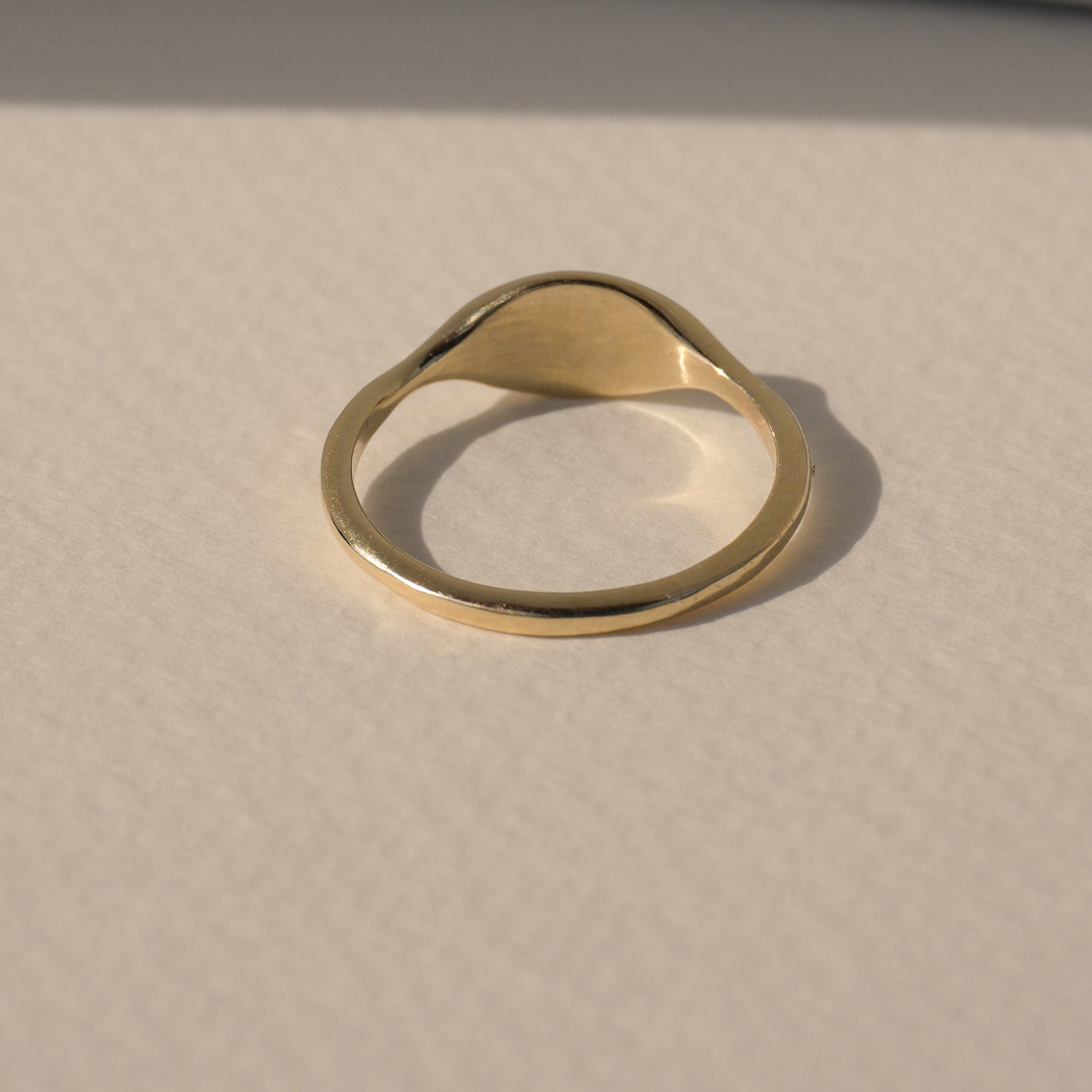 14k solid gold signet pinky ring, side view, high-polish